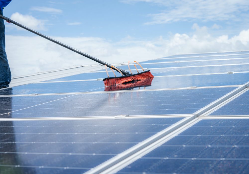 Technicians are cleaning solar panel,Clean solar panel in solar power plant.